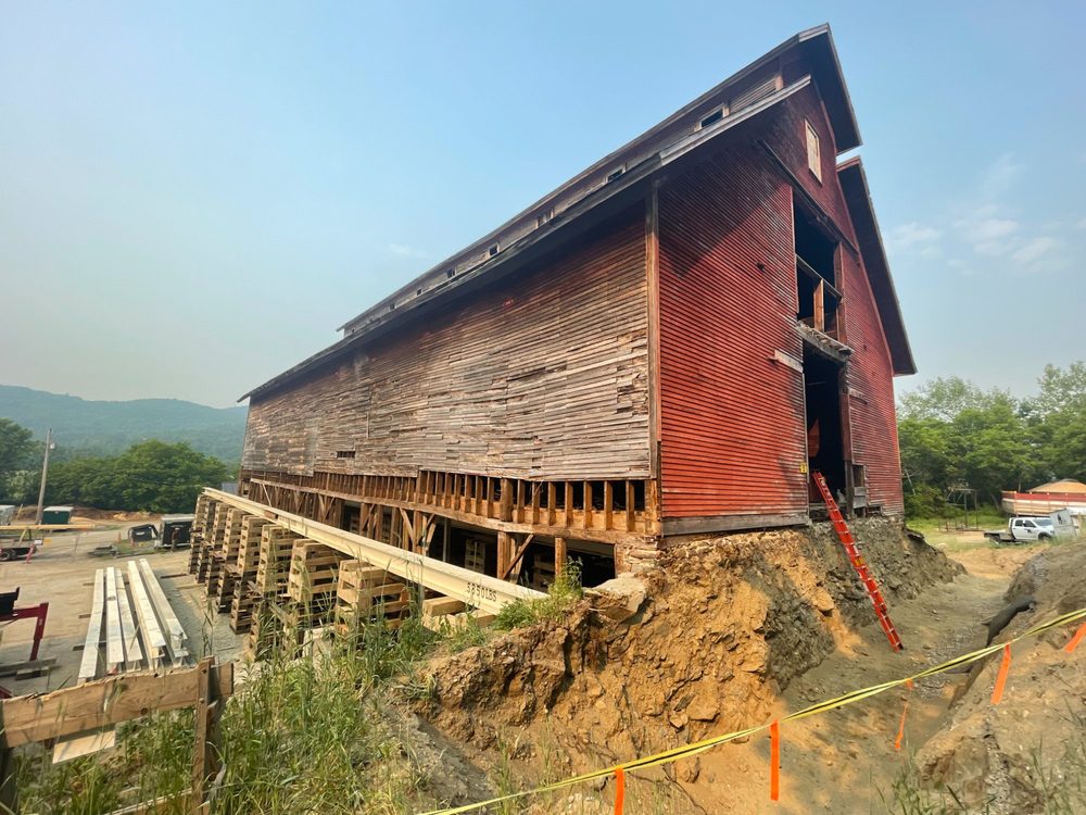 The East Monitor Barn during restoration, showing the scale of the historic structure